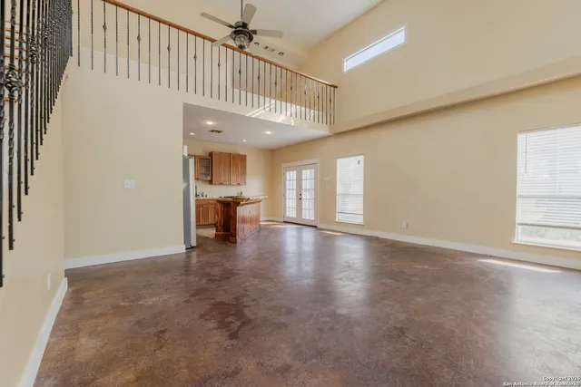 an entryway in a hall with a window