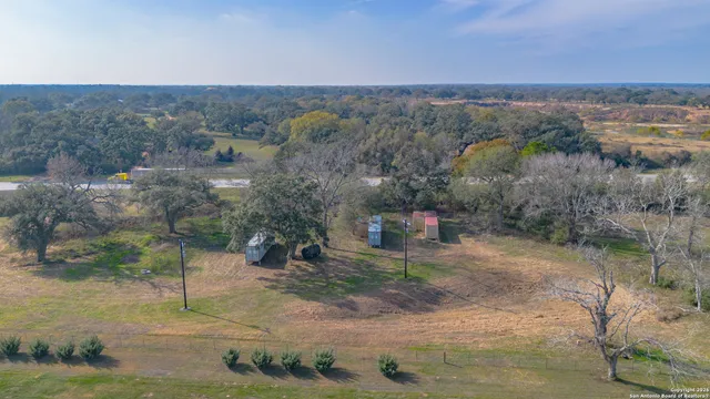 an aerial view of a town with couple of houses