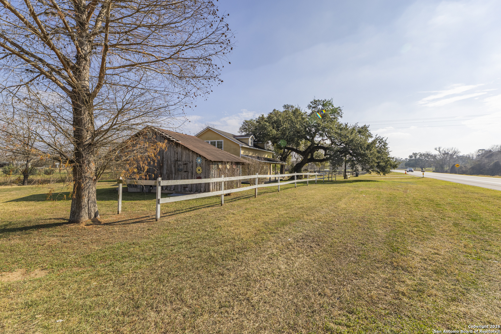 4419 State Highway 71 Columbus, TX 78934 - Photo 6 of 49 a view of a swimming pool with an outdoor space and seating area