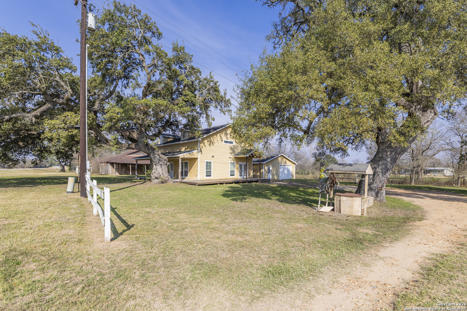 4419 State Highway 71 Columbus, TX 78934 - Photo 7 of 49 a house with trees in front of it