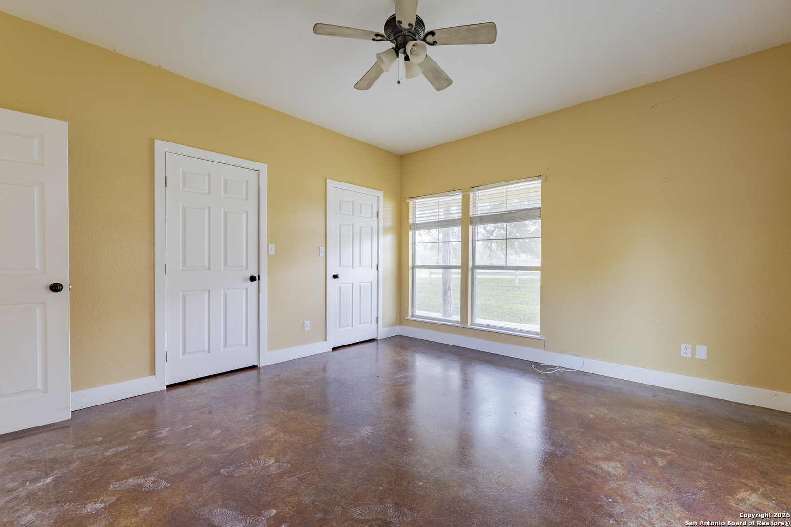 4419 State Highway 71 Columbus, TX 78934 - Photo 9 of 49 a view of a big room with wooden floor and windows
