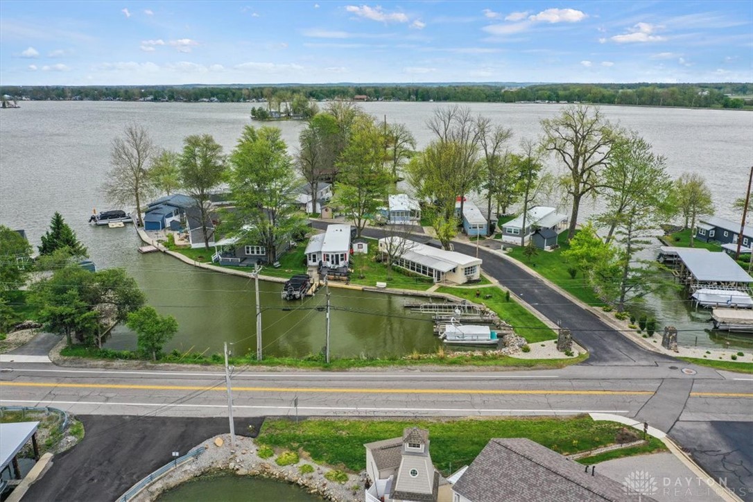246 North Orchard Island Road Russells Point, OH 43348 - Photo 31 of 43 This aerial view showcases a vibrant waterfront community with direct lake access and private boat docks.