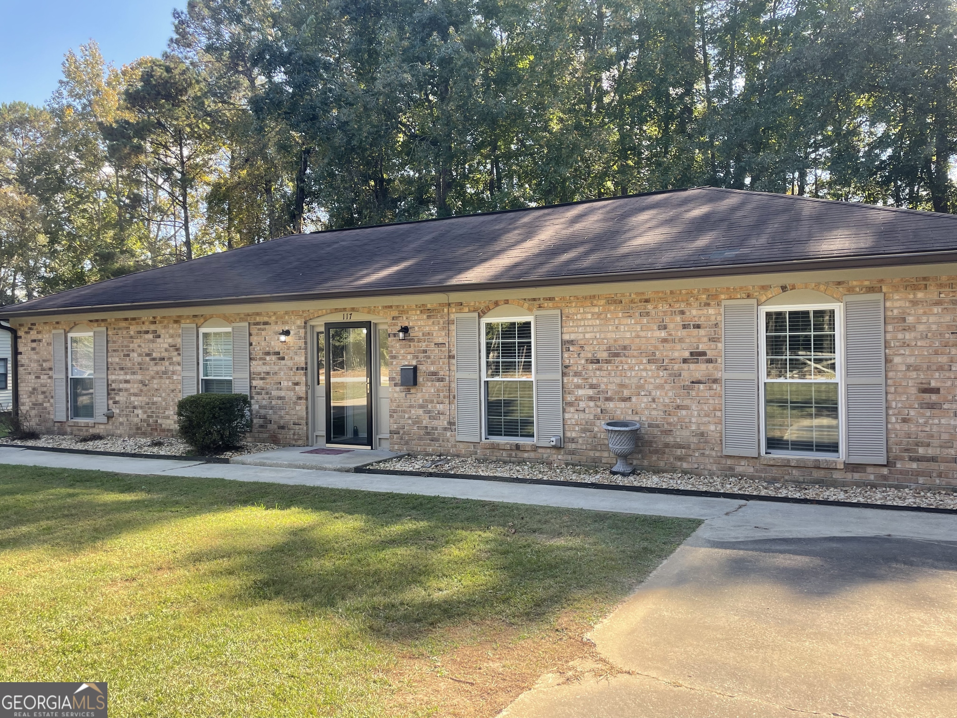 117 Valleywood Road, Unit B Tyrone, GA 30290 - Photo 1 of 1 a view of house with swimming pool outdoor seating area and barbeque oven