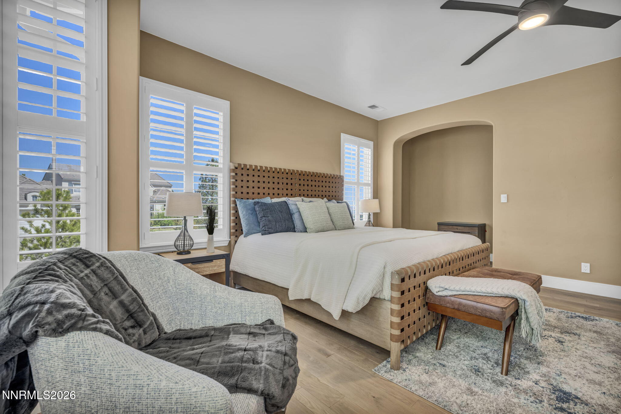 2965 Roundrock Court Reno, NV 89511 - Photo 21 of 40 a bedroom with a bed and wooden floor