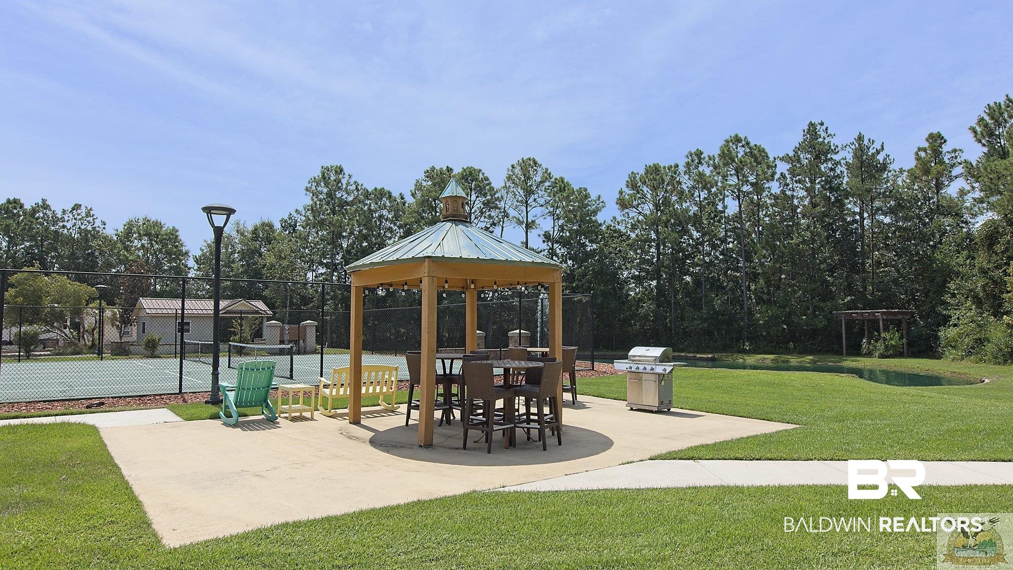 12489 Gateway Drive Elberta, AL 36530 - Photo 43 of 55 View of jungle gym with fence, a gazebo, a yard, and a tennis court