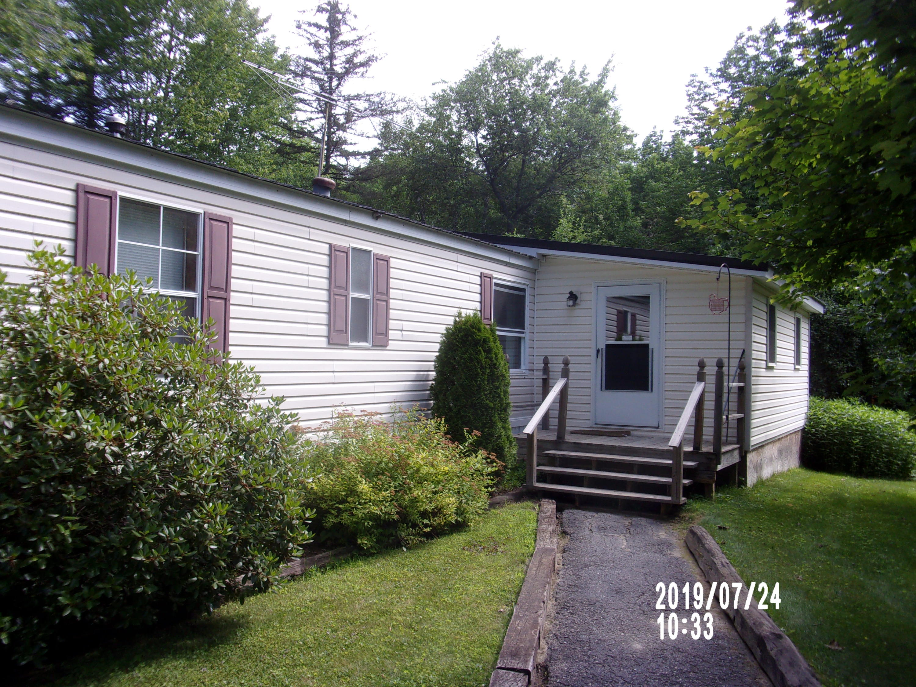 143 Dyer Road Dover-Foxcroft, ME 04426 - Photo 4 of 20 front walkway view to porch