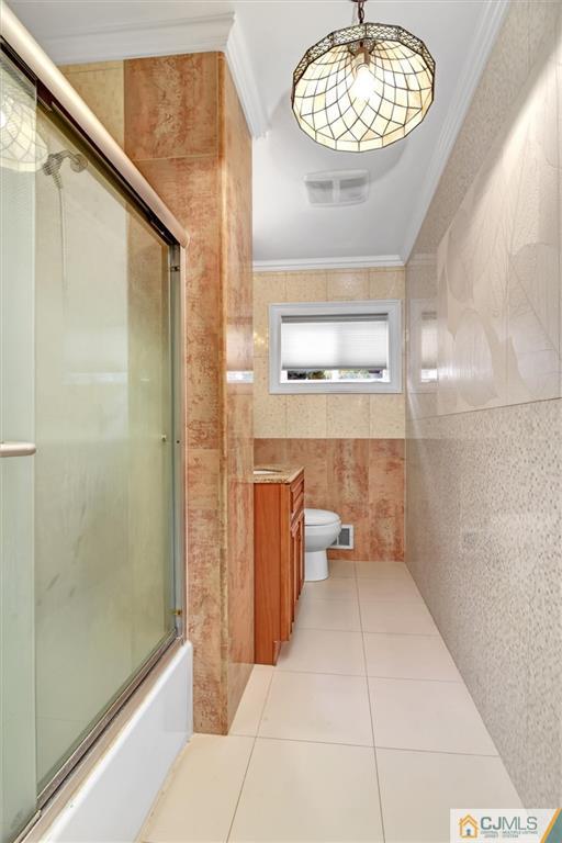 17 Brandeis Road Old Bridge, NJ 08859 - Photo 19 of 30 a bathroom with a toilet a sink and shower