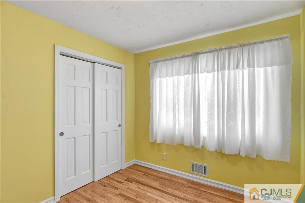 17 Brandeis Road Old Bridge, NJ 08859 - Photo 21 of 30 a view of a room with window and carpet
