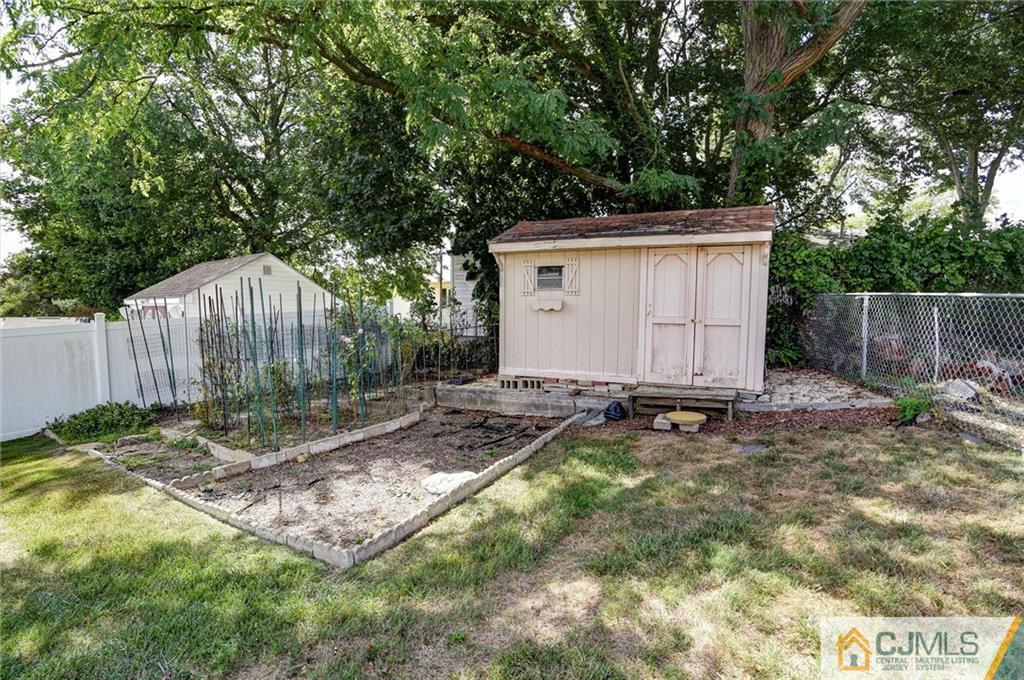17 Brandeis Road Old Bridge, NJ 08859 - Photo 29 of 30 a backyard of a house with trampoline