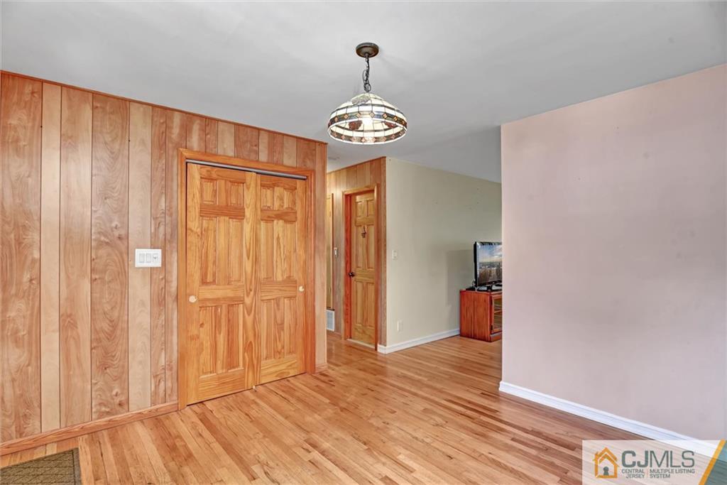 17 Brandeis Road Old Bridge, NJ 08859 - Photo 5 of 30 a view of an empty room with wooden floor
