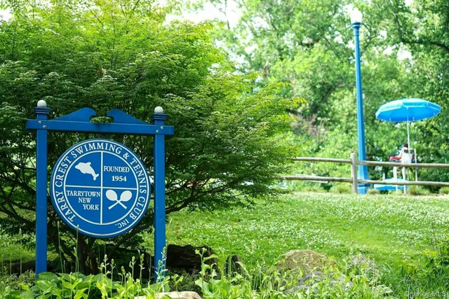 a outdoor view of a building with traffic signal lights