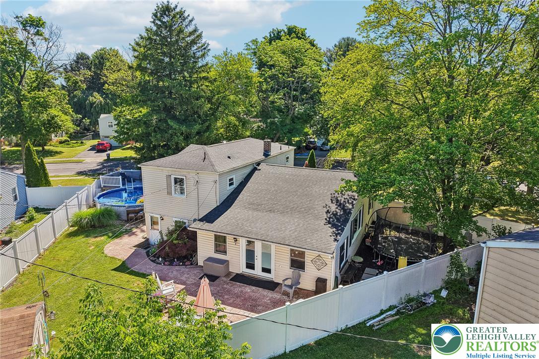 2649 Nottingham Road Bethlehem, PA 18017 - Photo 41 of 49 An inviting backyard oasis offers a brick patio, lush lawn, and private swimming pool.