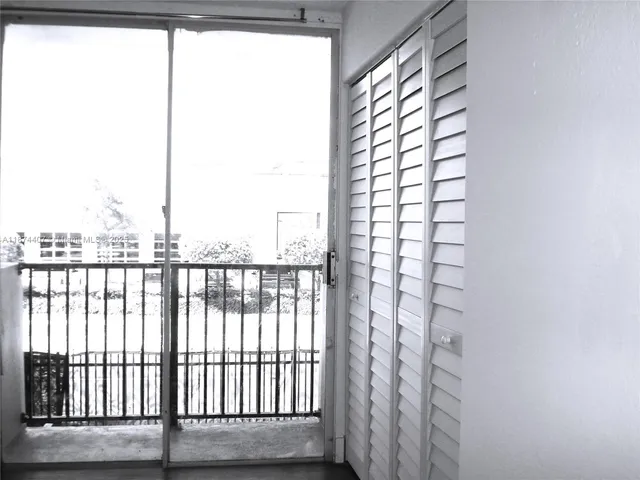 a view of a balcony from a window