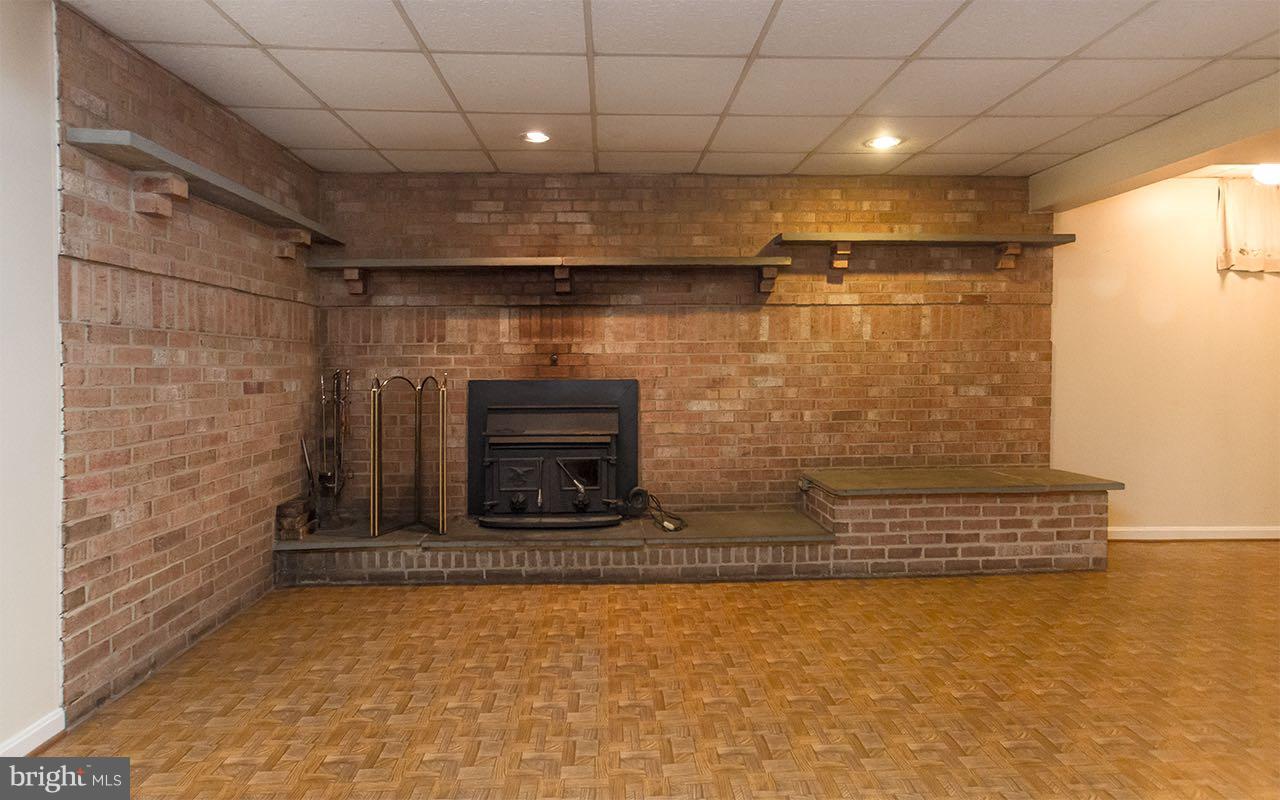 3905 Church Road Manchester, MD 21102 - Photo 16 of 30 Full brick fireplace w/raised brick hearth