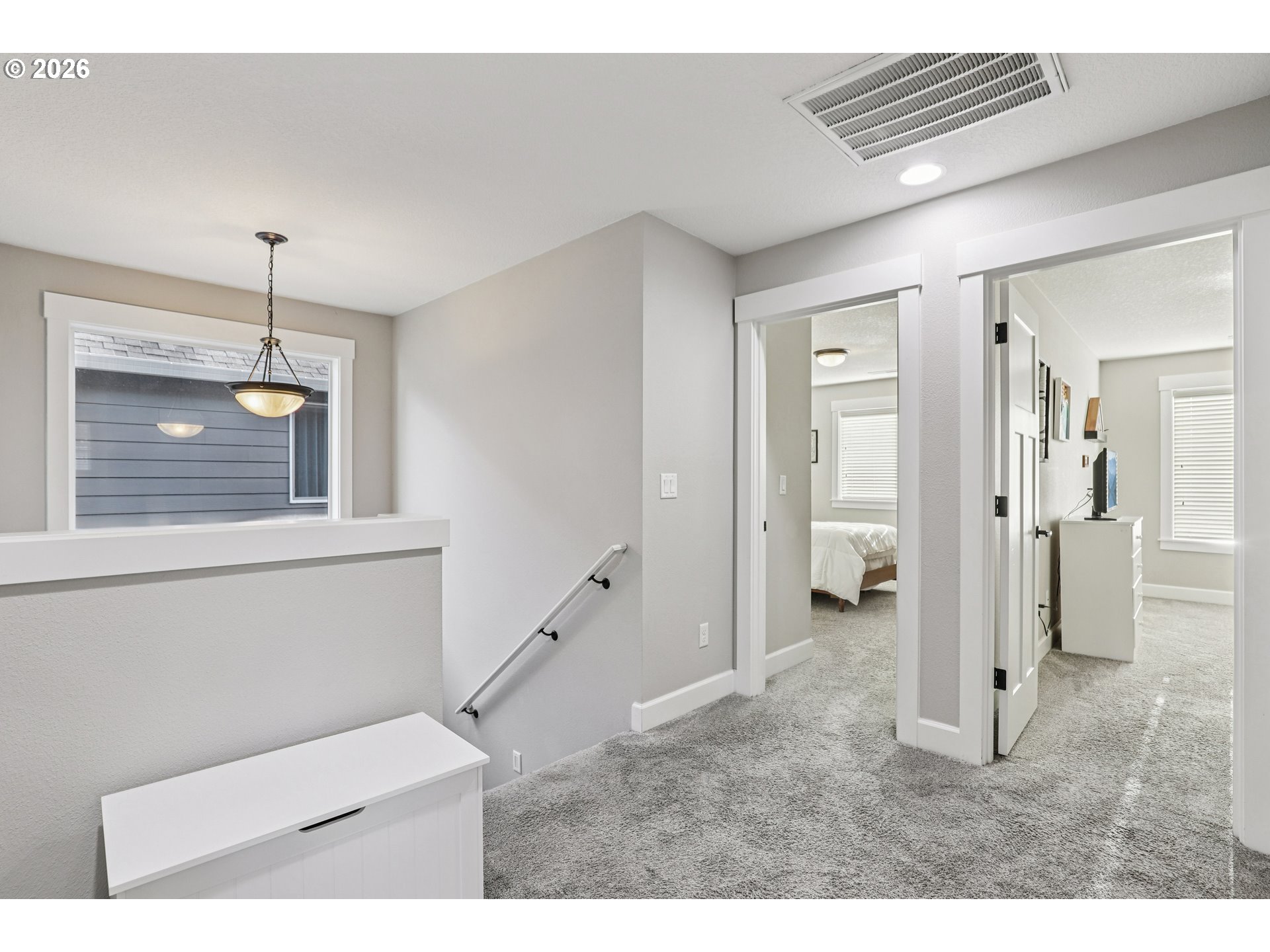 7346 South 13th Street Ridgefield, WA 98642 - Photo 16 of 38 a bathroom with a toilet sink and a mirror