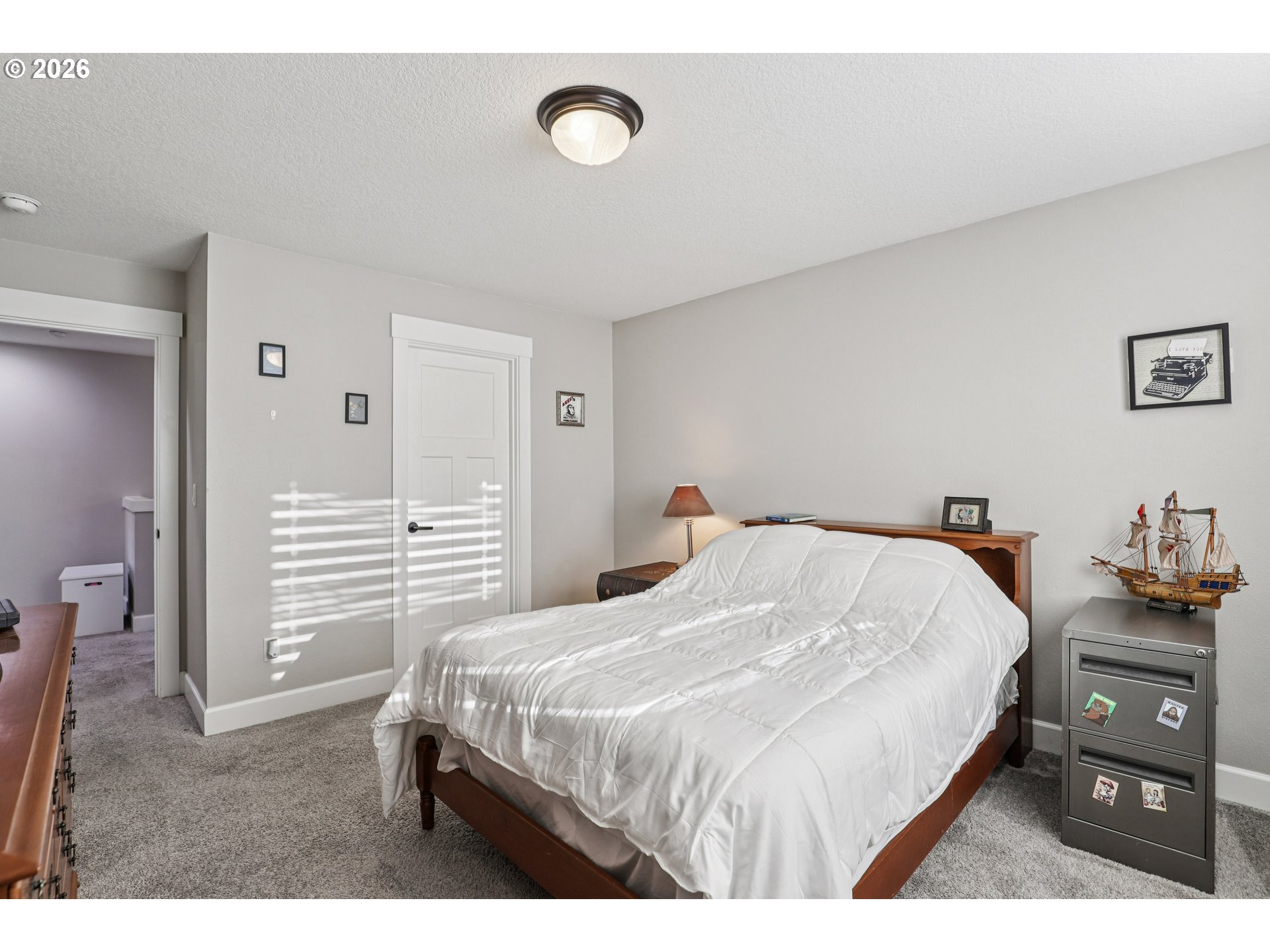 7346 South 13th Street Ridgefield, WA 98642 - Photo 17 of 38 a bedroom with a bed and a closet