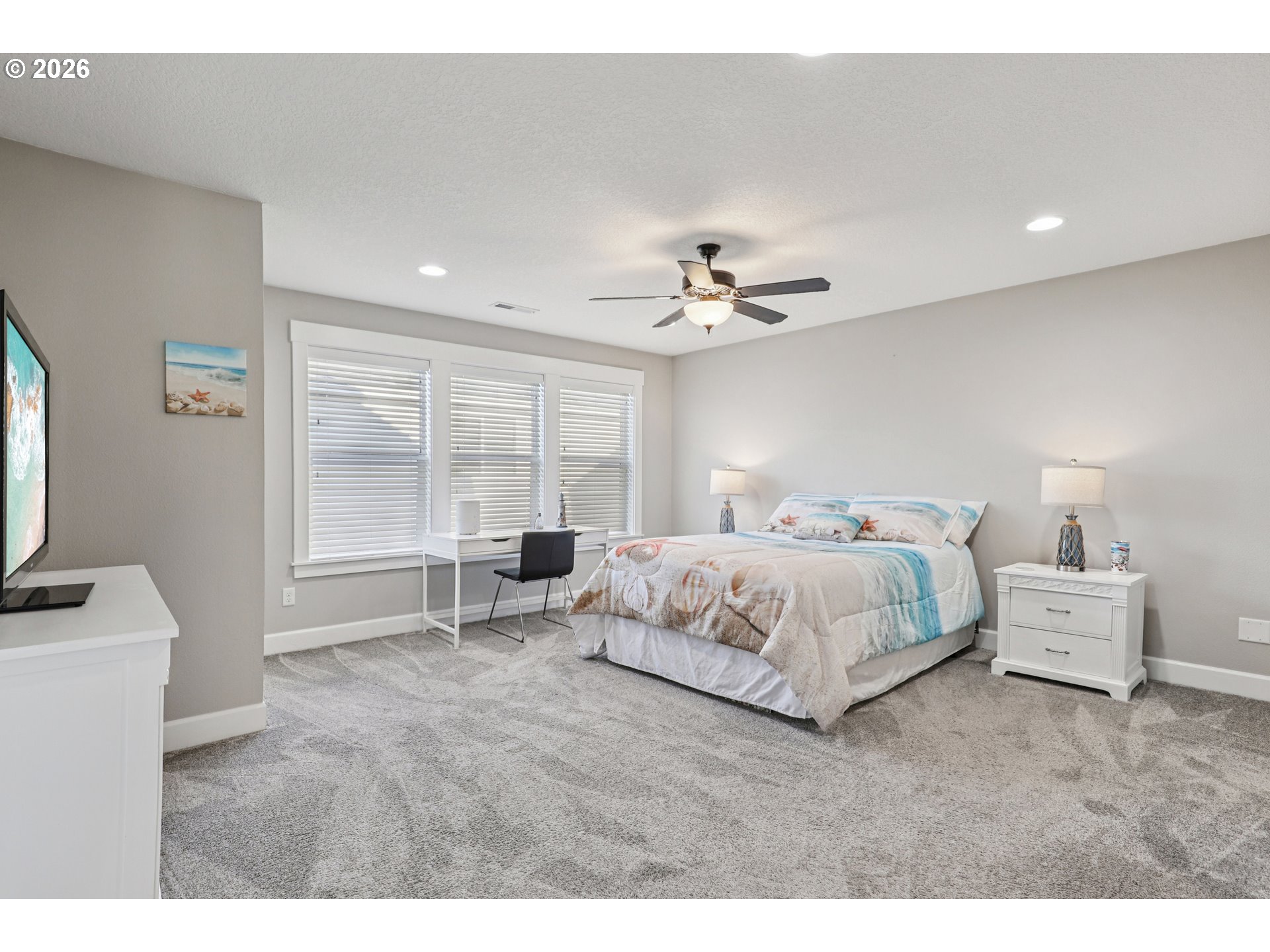 7346 South 13th Street Ridgefield, WA 98642 - Photo 20 of 38 a spacious bedroom with a bed and a window