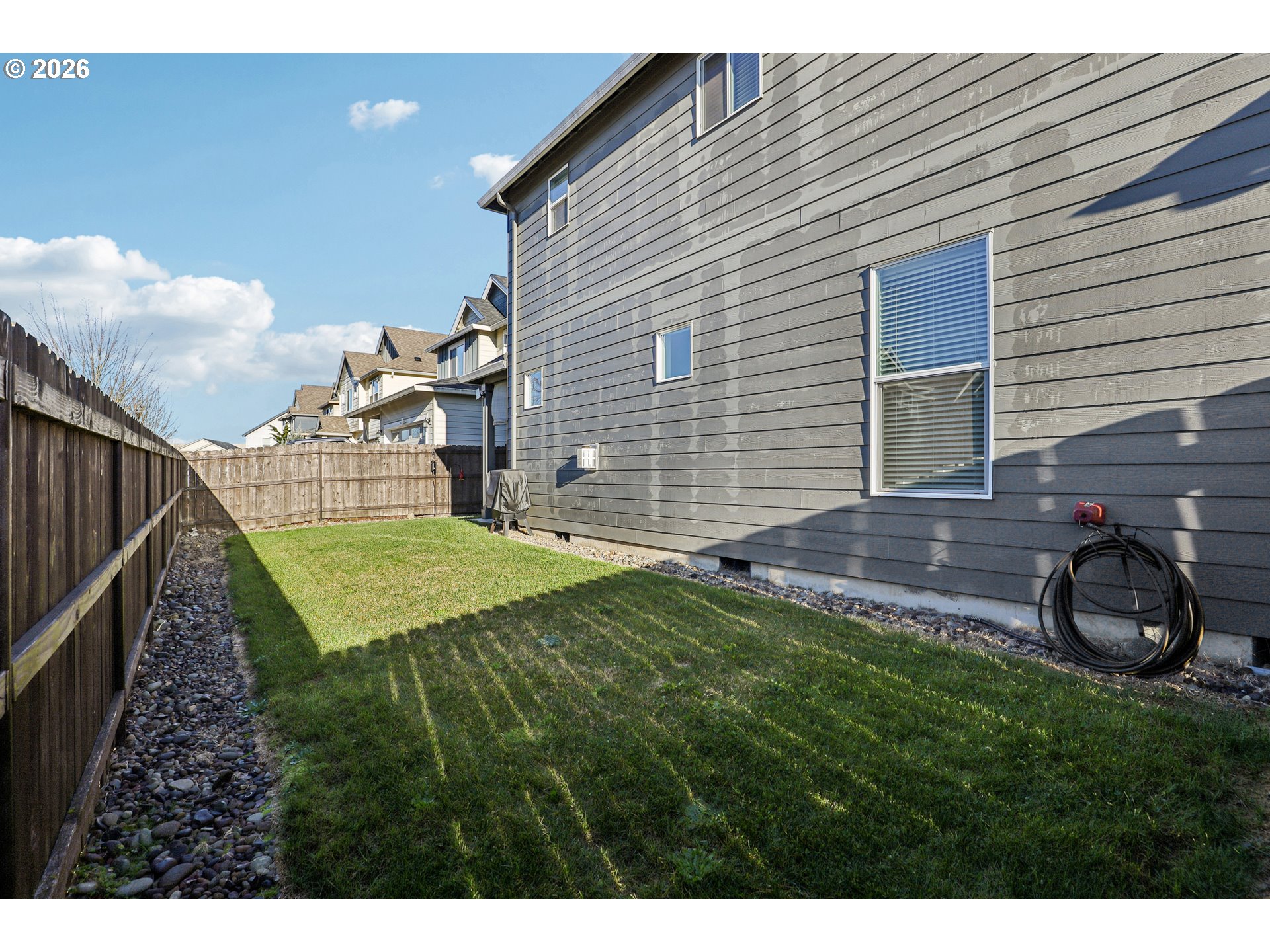 7346 South 13th Street Ridgefield, WA 98642 - Photo 31 of 38 a view of backyard with wooden fence