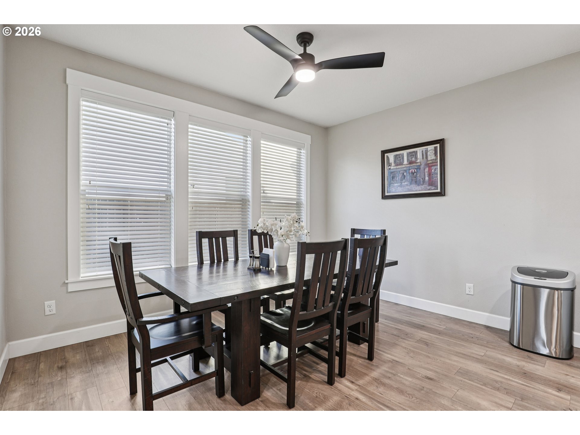 7346 South 13th Street Ridgefield, WA 98642 - Photo 8 of 38 a view of a dining room with furniture window and wooden floor