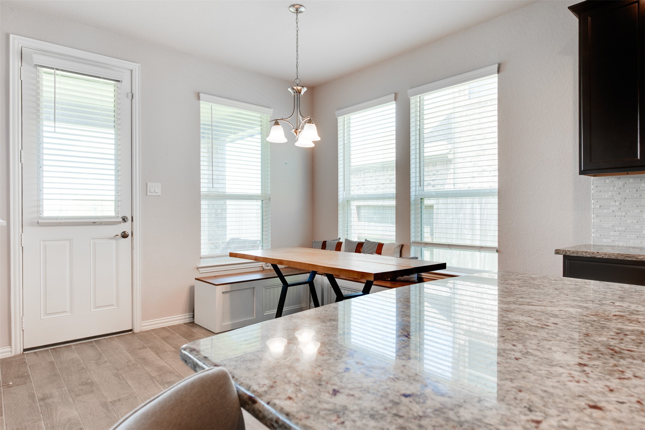 4310 Markstone Ridge Lane Rosharon, TX 77583 - Photo 17 of 40 a view of a living room and chandelier