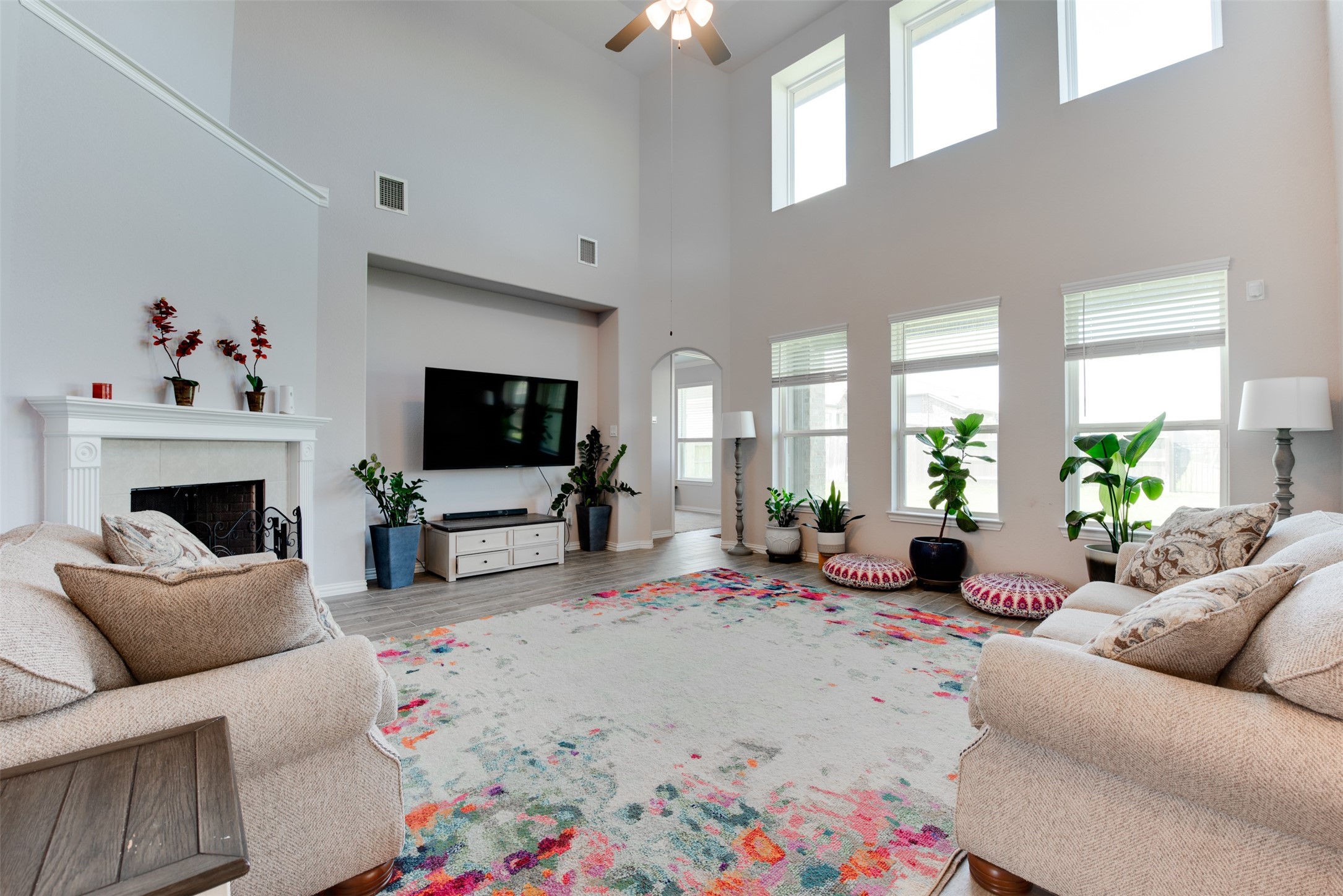 4310 Markstone Ridge Lane Rosharon, TX 77583 - Photo 2 of 40 a living room with furniture and a flat screen tv