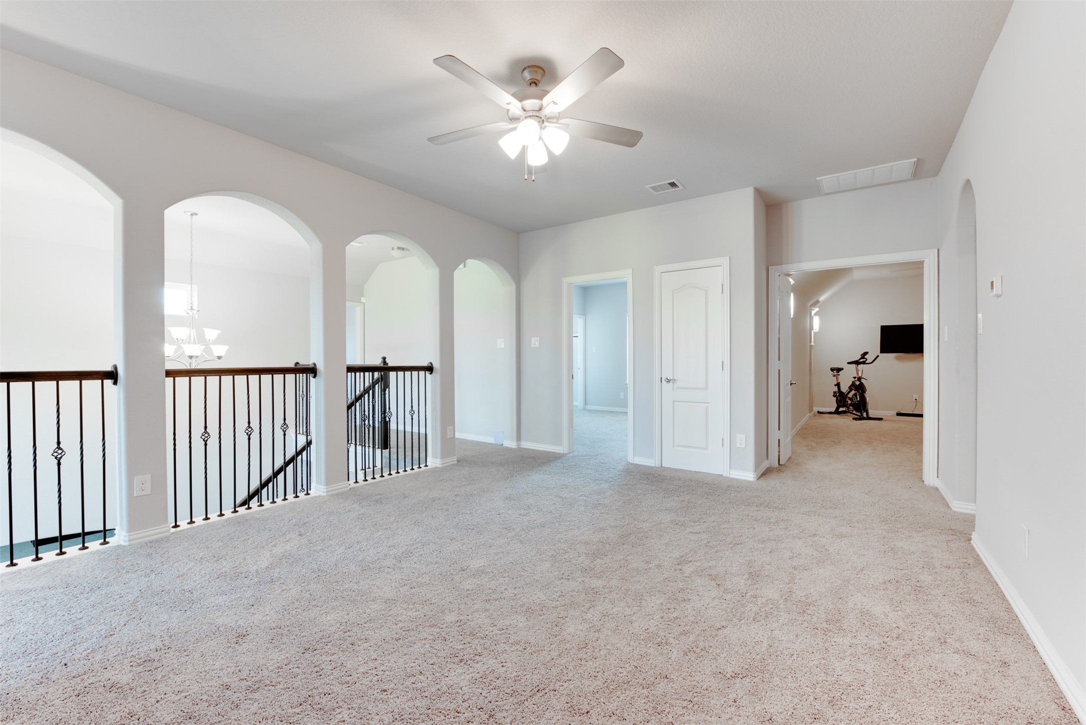 4310 Markstone Ridge Lane Rosharon, TX 77583 - Photo 29 of 40 a view of a livingroom with a ceiling fan and entryway