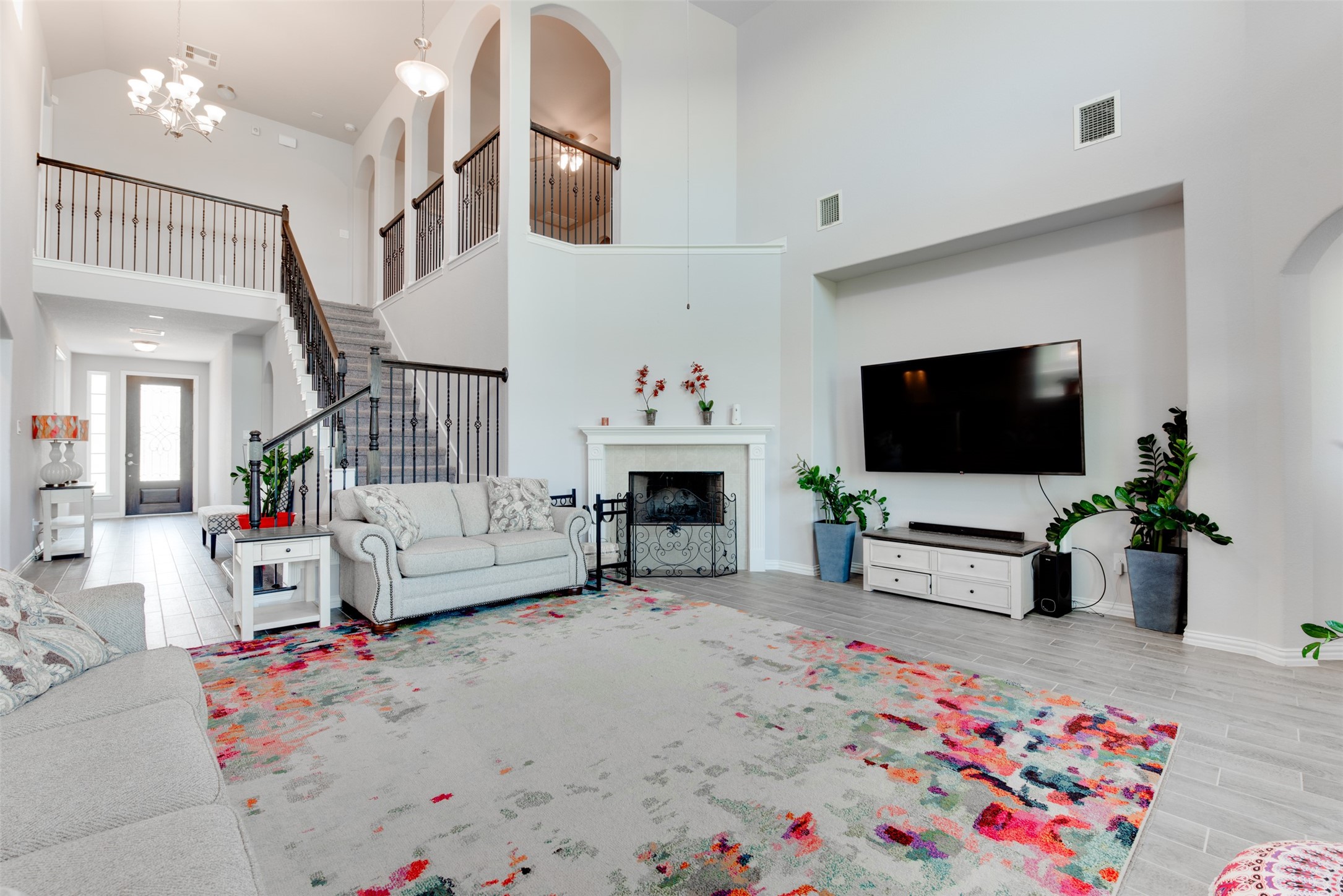4310 Markstone Ridge Lane Rosharon, TX 77583 - Photo 10 of 40 a living room with furniture and a flat screen tv