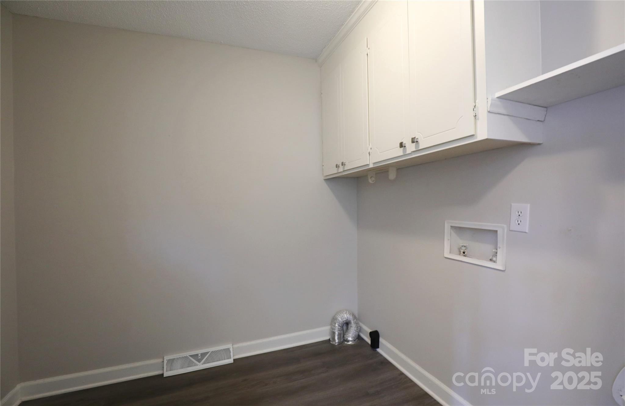 14027 Hackamore Drive Matthews, NC 28105 - Photo 12 of 29 a view of a small space with wooden floor and a window