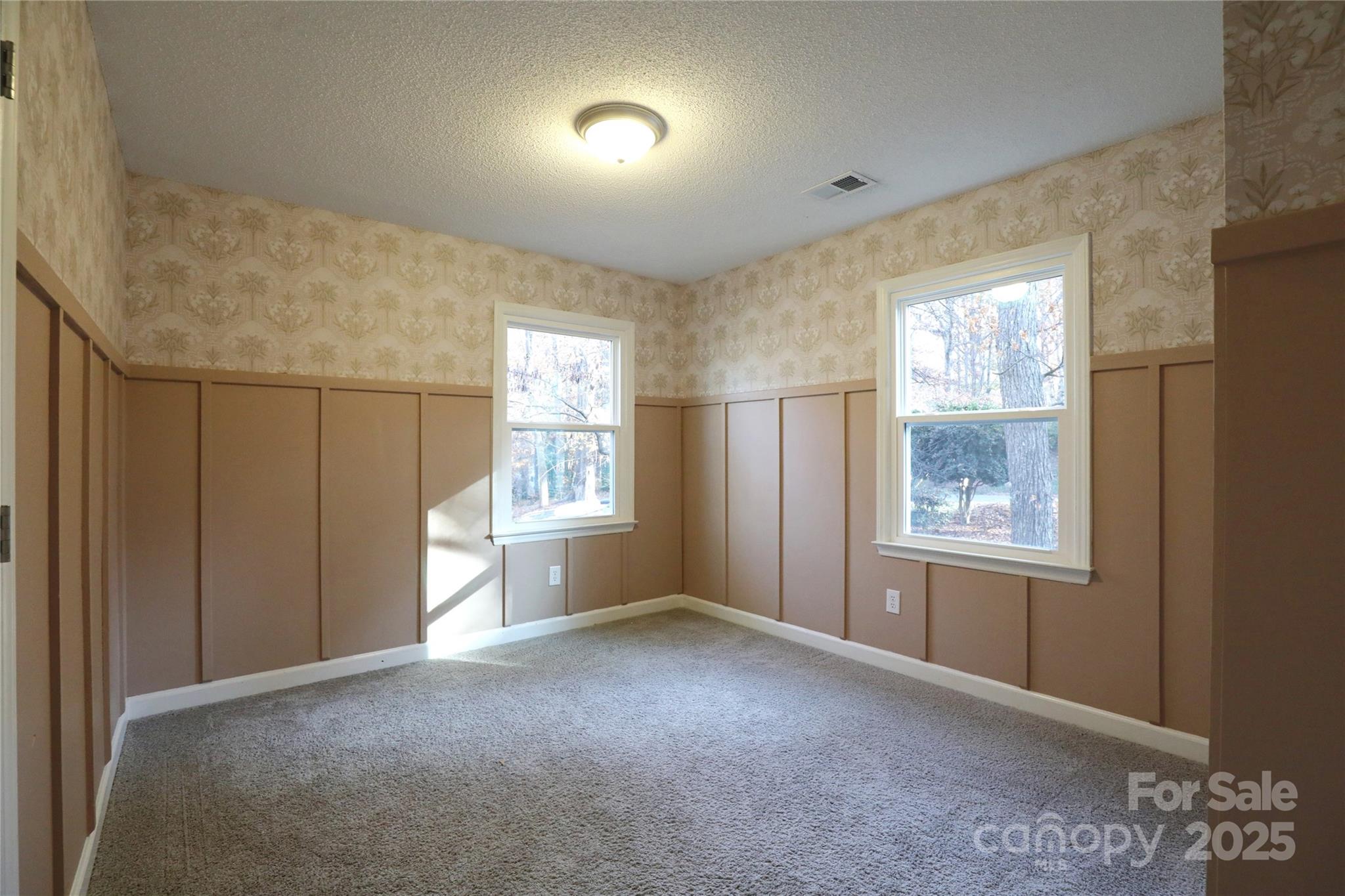 14027 Hackamore Drive Matthews, NC 28105 - Photo 18 of 29 a view of an empty room with a window