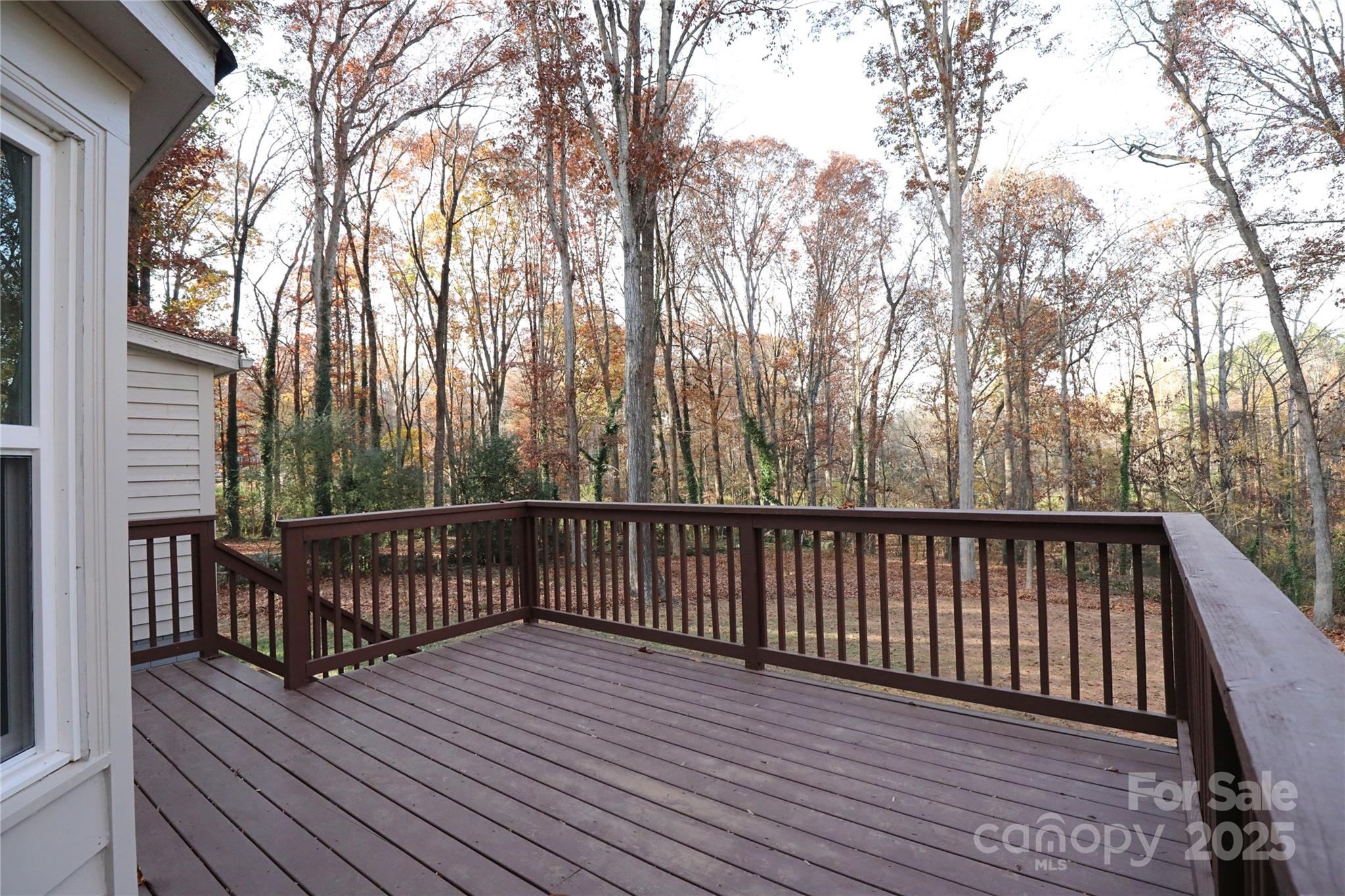 14027 Hackamore Drive Matthews, NC 28105 - Photo 25 of 29 a view of balcony with wooden floor