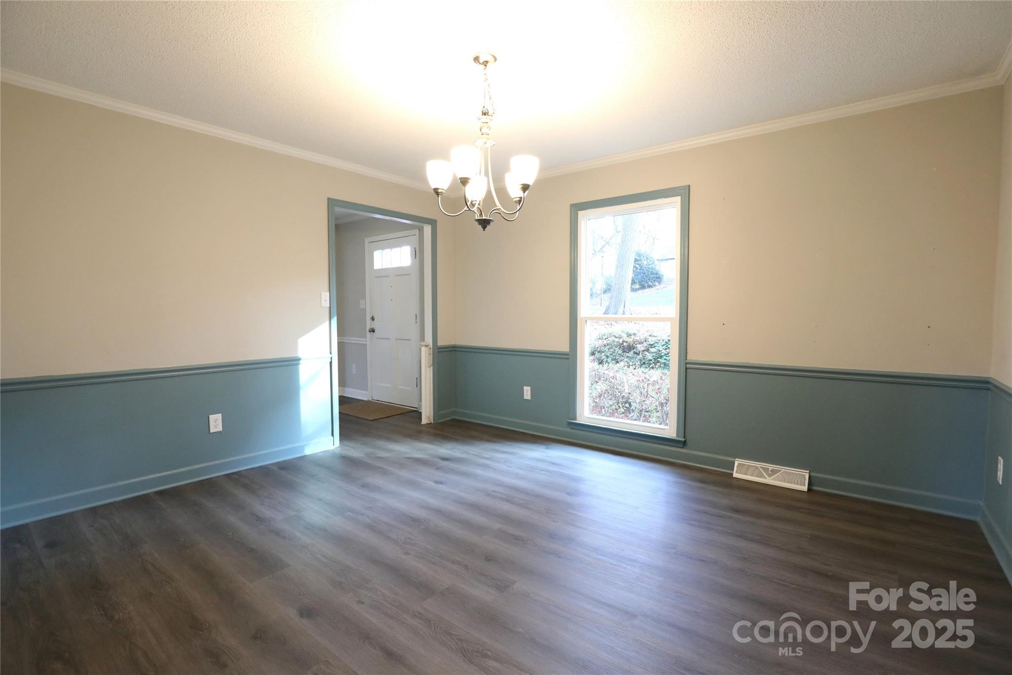 14027 Hackamore Drive Matthews, NC 28105 - Photo 10 of 29 wooden floor in an empty room with a window