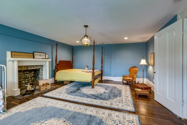 a room with furniture and a fireplace