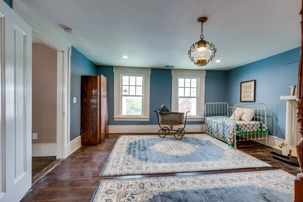 a view of living room filled with furniture and window