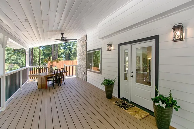 a view of a house with porch and wooden floor
