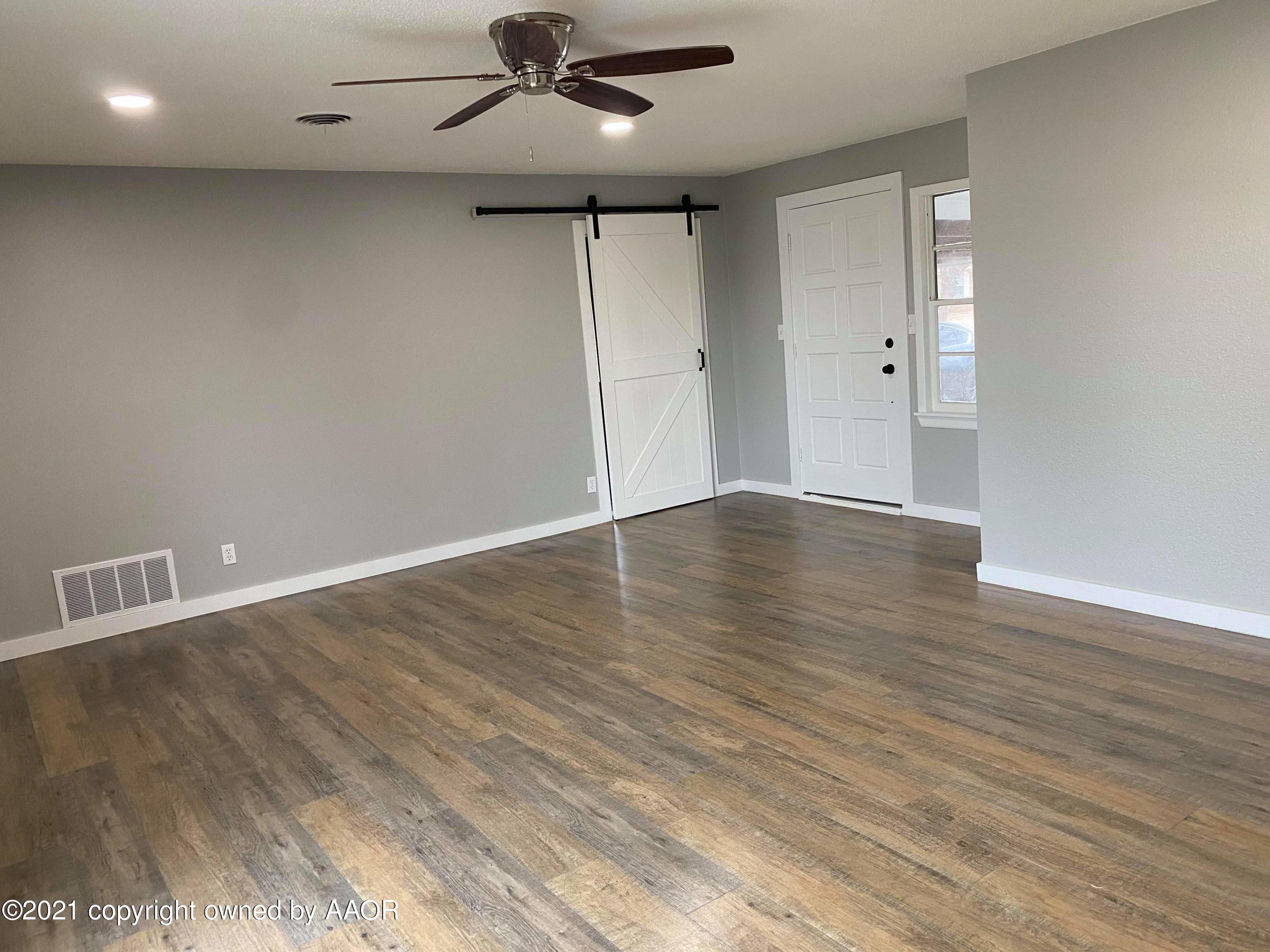 4304 South Bonham Street Amarillo, TX 79110 - Photo 8 of 9 wooden floor in an empty room