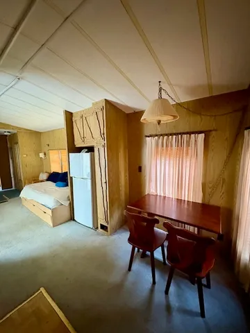 a room with furniture and a window