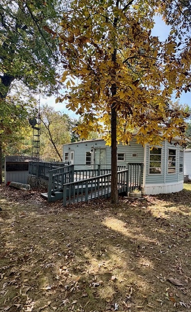2-262 Woodhaven Sublette, IL 61367 - Photo 2 of 20 a view of a house with a tree in front of it