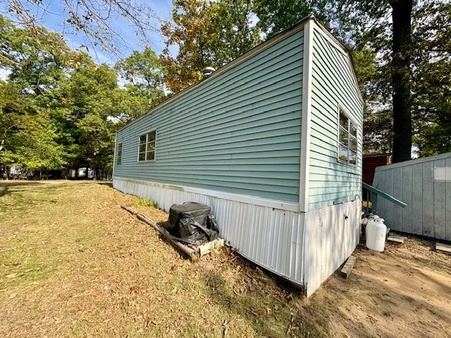a view of backyard of a house