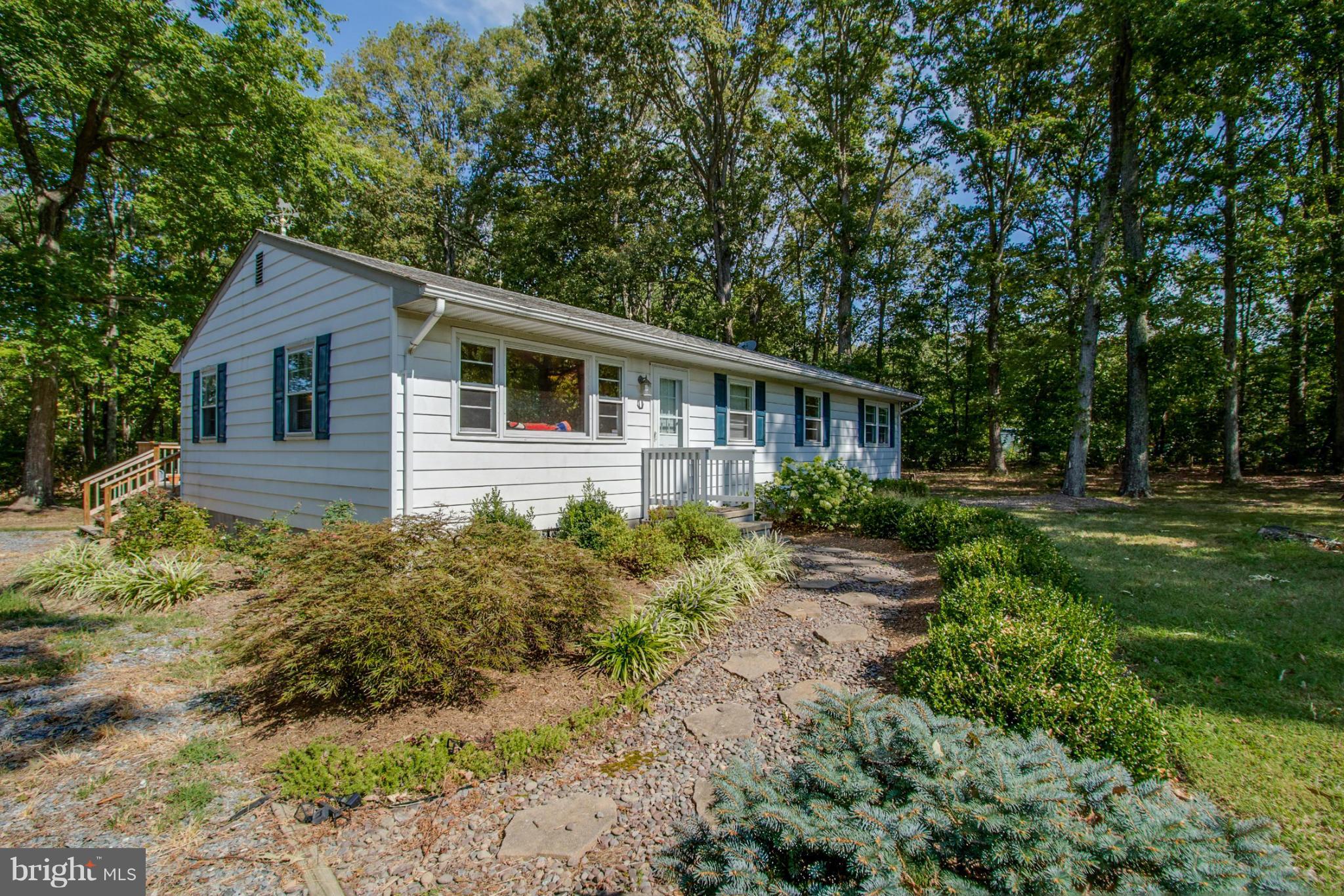 22501 Newtowne Neck Road Leonardtown, MD 20650 - Photo 3 of 27 Extensive Landscaping w/ stepping stones