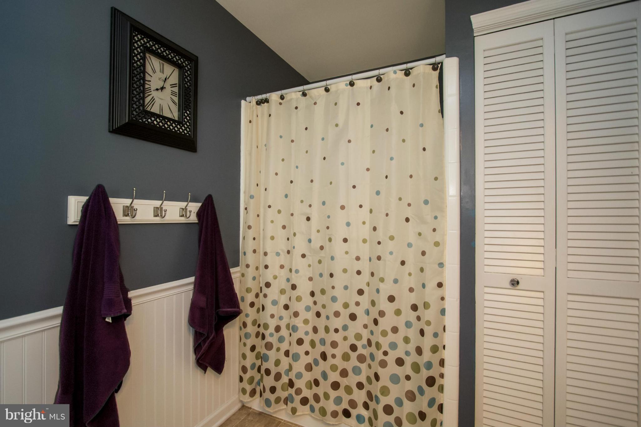 22501 Newtowne Neck Road Leonardtown, MD 20650 - Photo 22 of 27 Master Bathroom w/ Towel hooks & Wainscoting