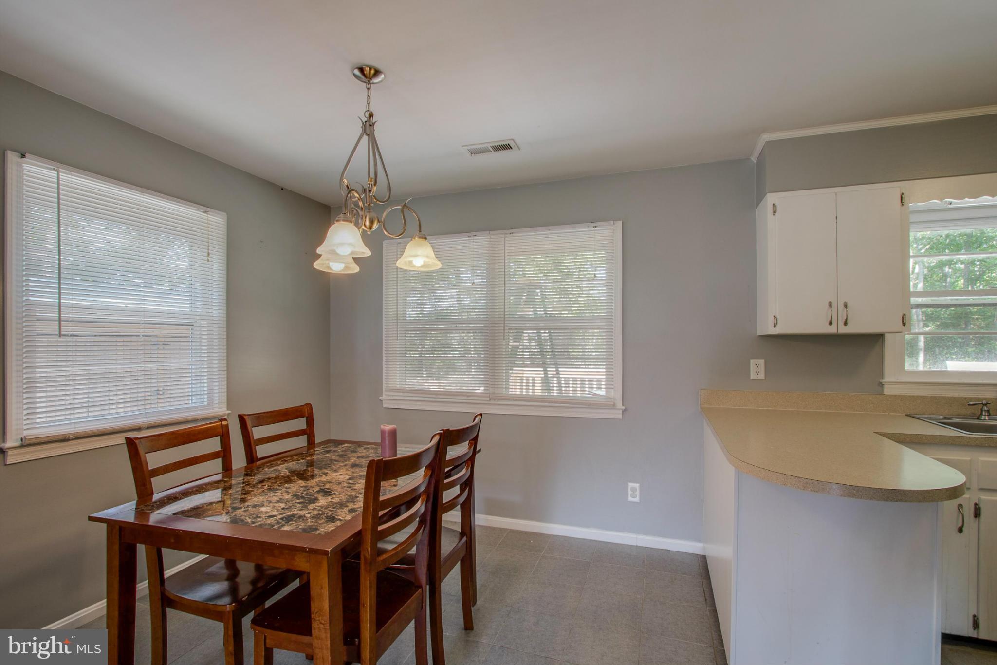 22501 Newtowne Neck Road Leonardtown, MD 20650 - Photo 6 of 27 Dining Room has plenty of natural light!