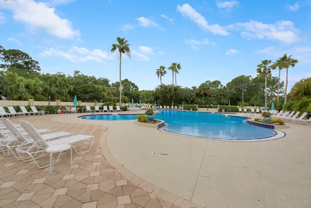 a view of a swimming pool and outdoor space