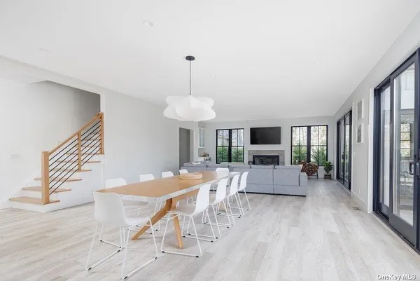 a view of a livingroom with furniture window and wooden floor