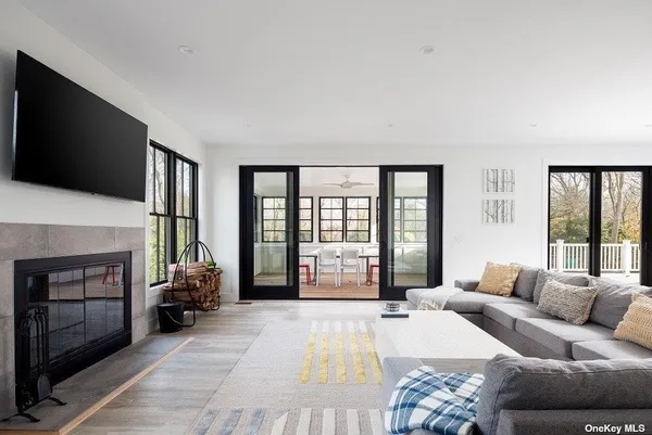 a spacious bedroom with a large bed and a large window