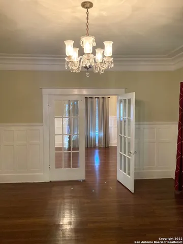 a view of a livingroom with wooden floor