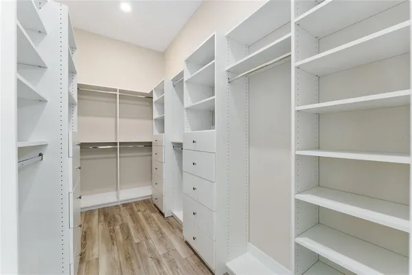 a bathroom with a double vanity sink mirror and double