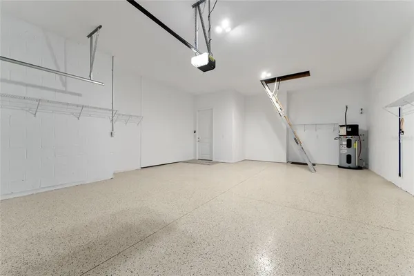 an aerial view of a house with a swimming pool