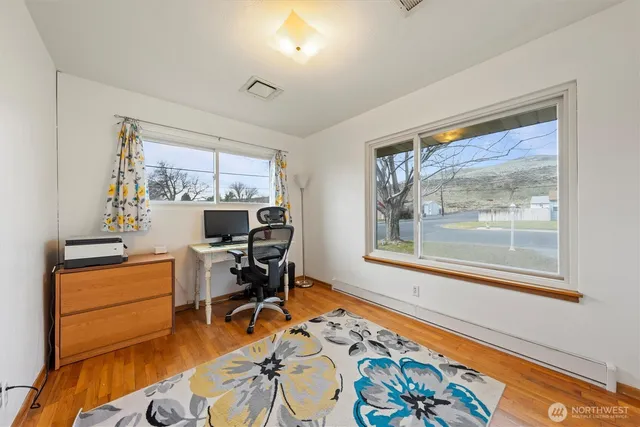 a room with furniture and a window