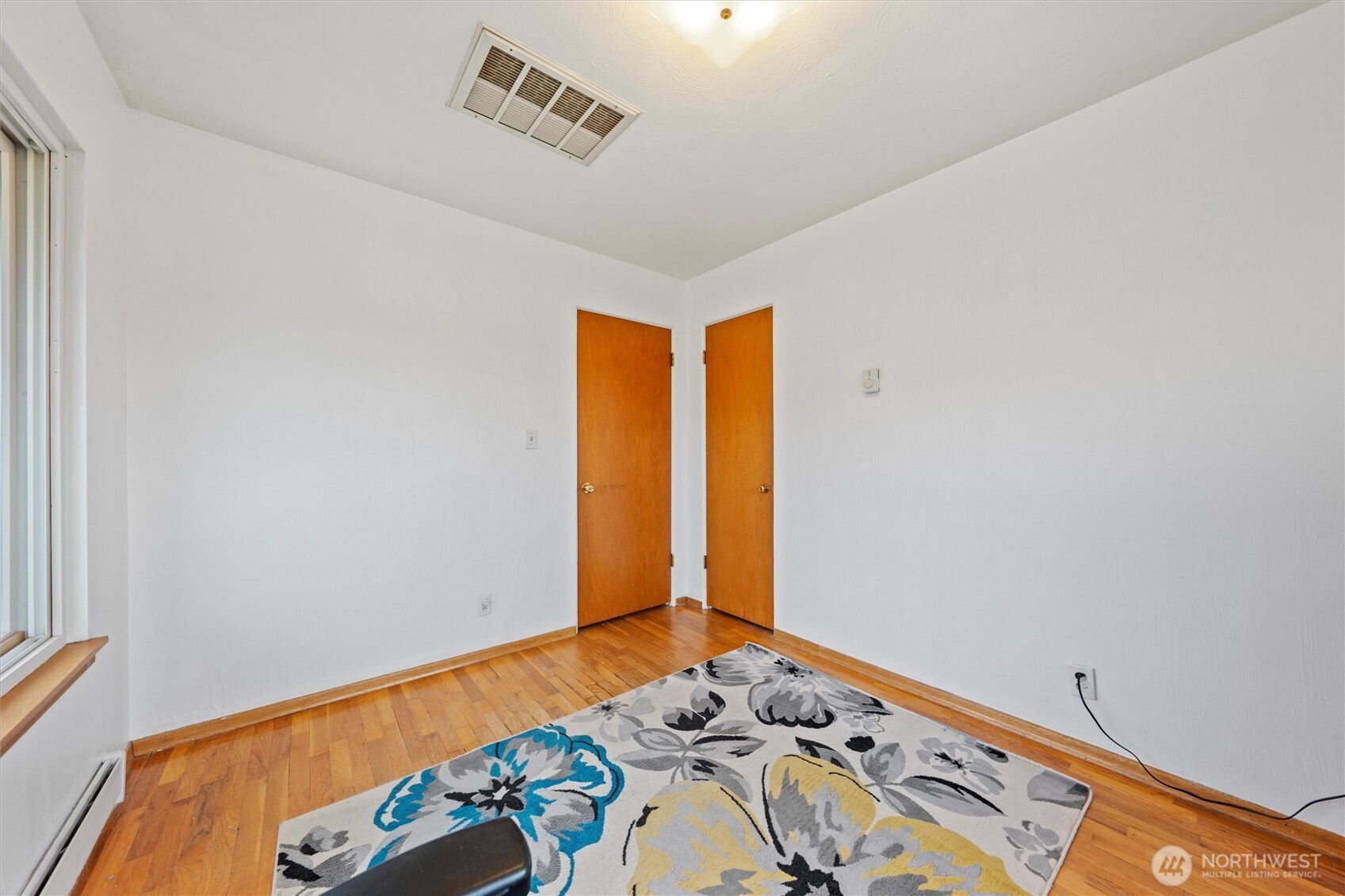 1162 D Street Southwest Ephrata, WA 98823 - Photo 20 of 37 a bedroom with a bed and a window