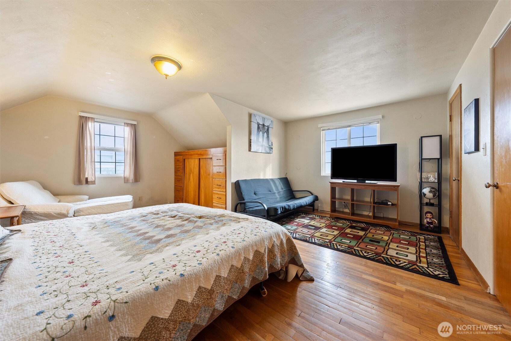 1162 D Street Southwest Ephrata, WA 98823 - Photo 25 of 37 a bedroom with a bed and a flat screen tv